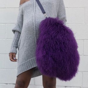 Oversized Mongolian purple bag.